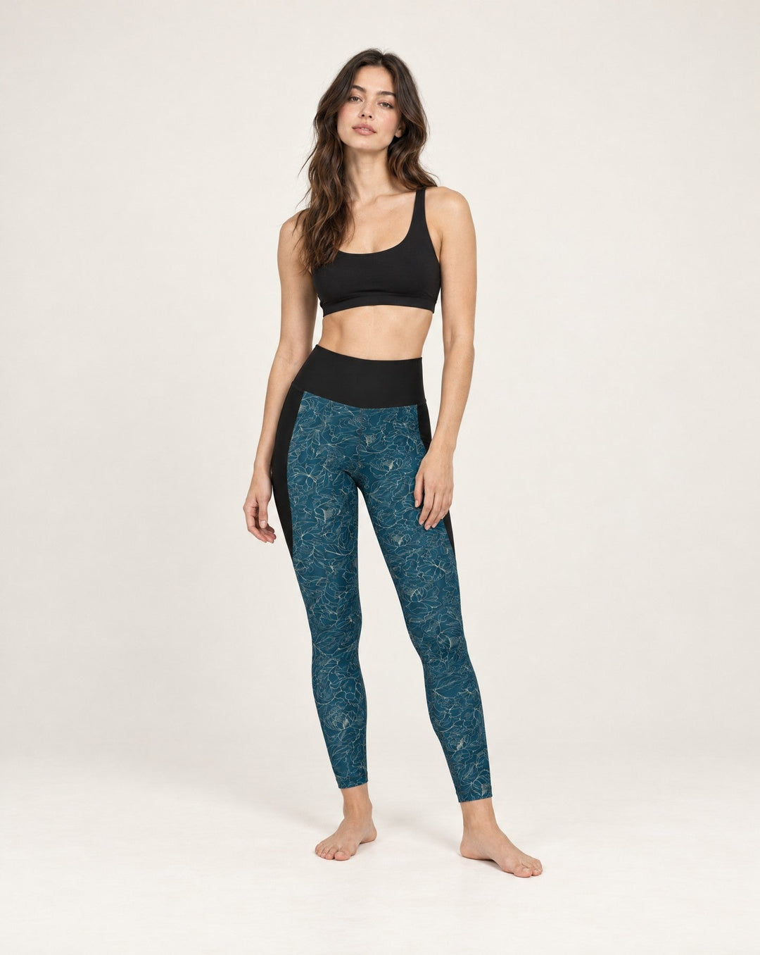 Vazzari Navy Glimmer Pocket Leggings on a female model in a clean white studio (woman)