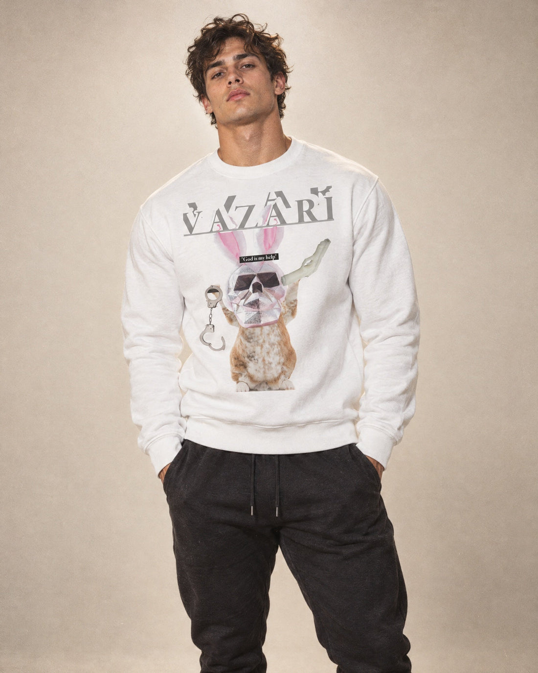 Model in the white Vazzari Bunnylocked 404 sweatshirt with a skull-masked rabbit graphic and grey wordmark, in a beige studio