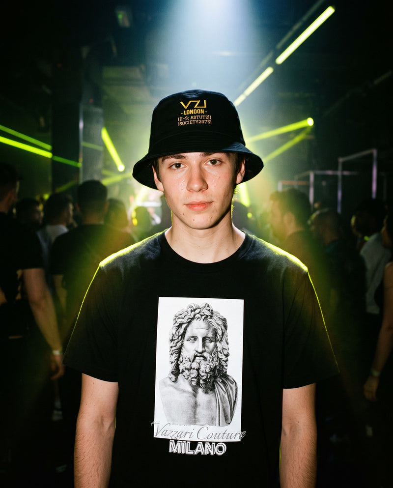 Model wearing Vazzari [I-S] Essentials in a neon club setting