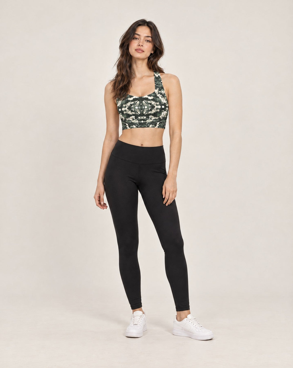 Vazzari Verdant Shadows Longline Sports Bra on a female model in a clean white studio (woman)
