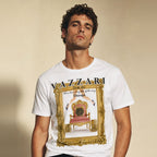 Model wearing the Vazzari Baroque Hack Tee in a beige studio (man)