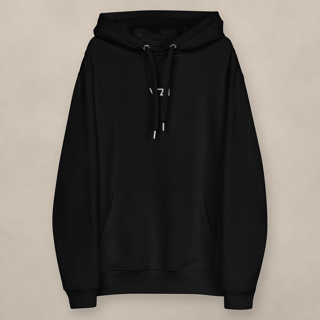 Vazzari Chic Women's Eco Hoodie on beige studio wall