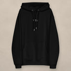 Vazzari Chic Women's Eco Hoodie on beige studio wall