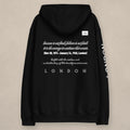 Vazzari Churchill Organic Hoodie on beige studio wall