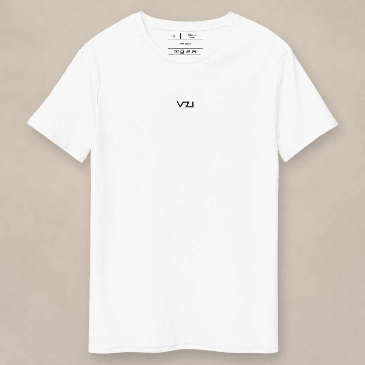 Vazzari Classic Cotton Tee on beige studio wall