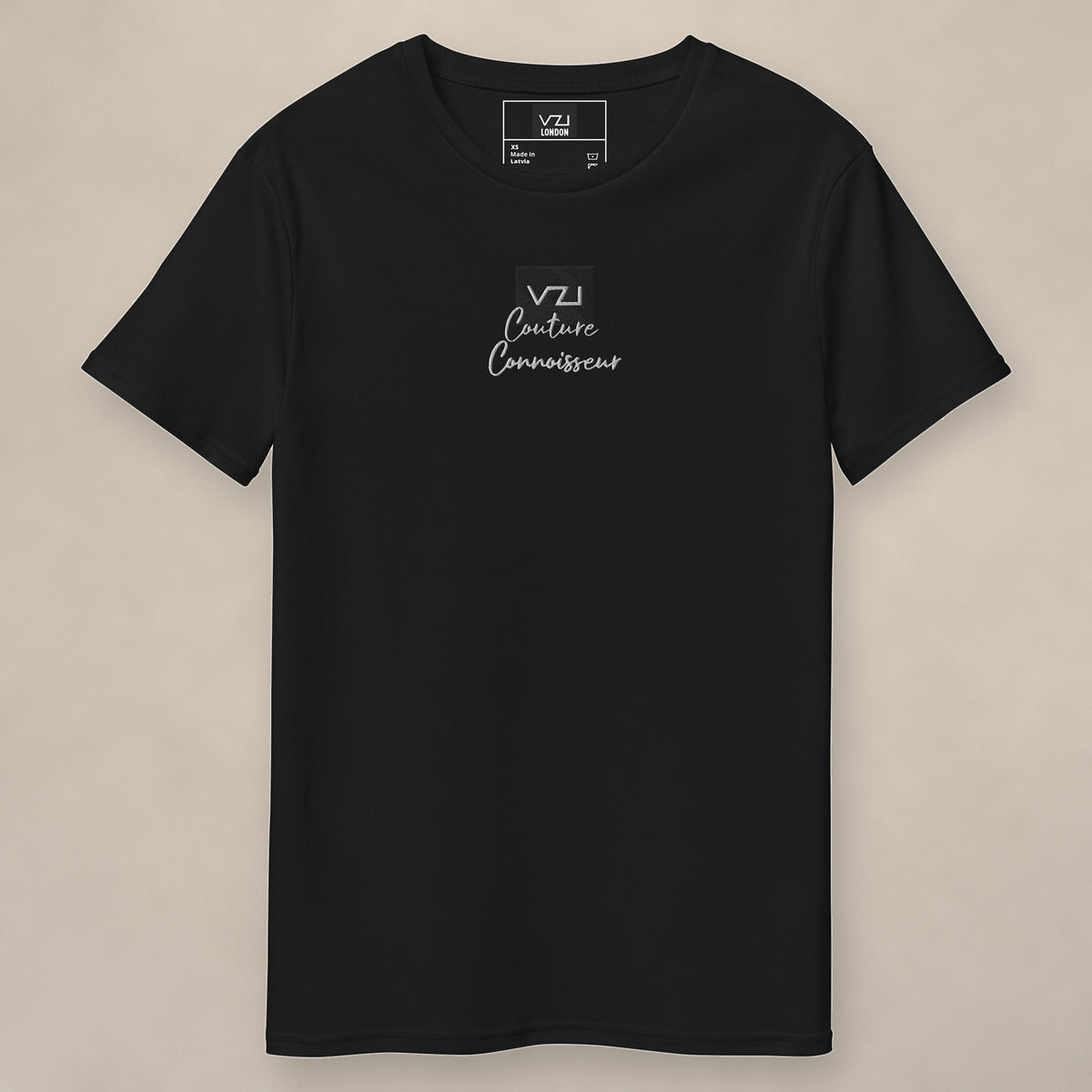 Vazzari Connoisseur Cotton Tee on beige studio wall