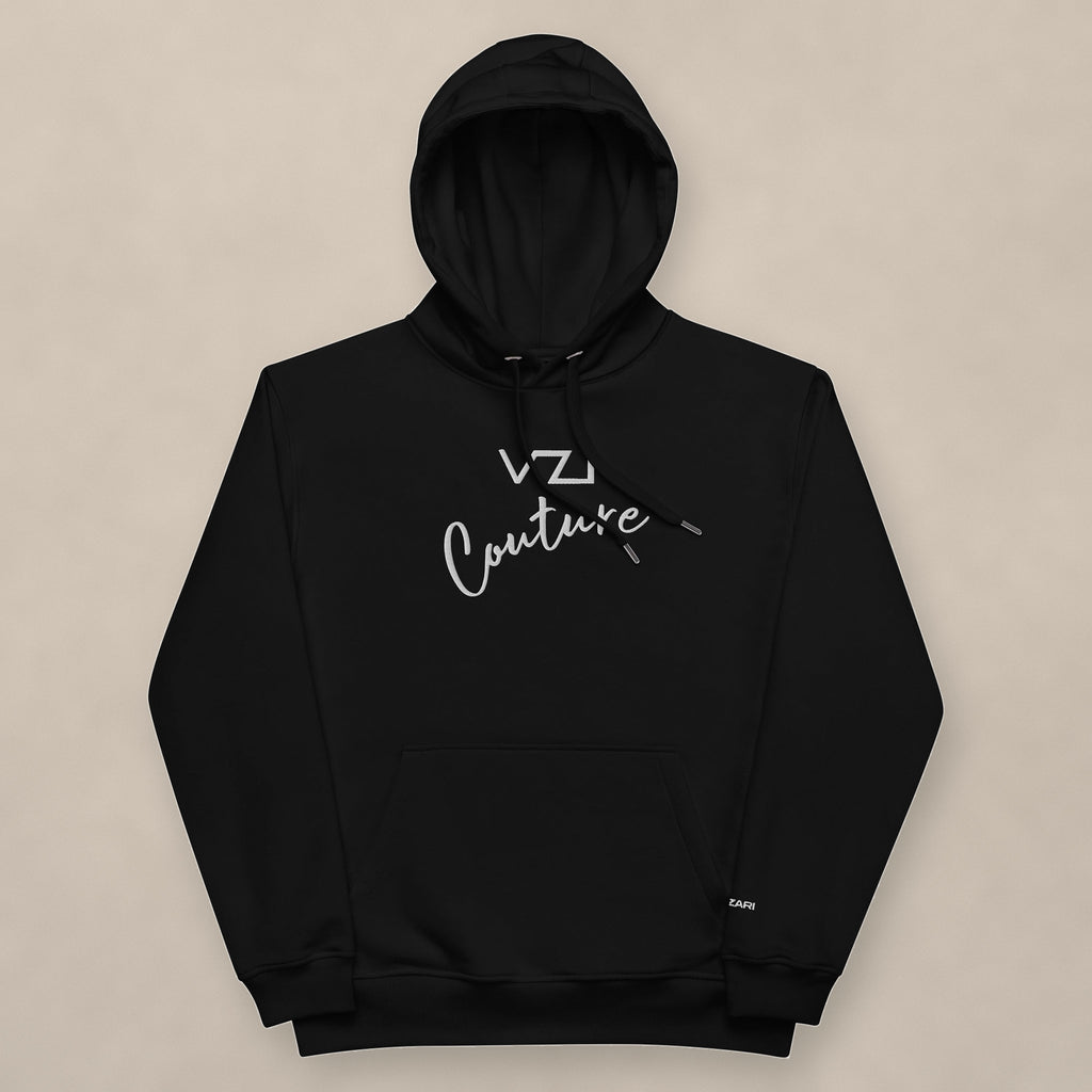 Vazzari Couture Eco Hoodie on beige studio wall