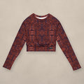 Vazzari Crimson Deities Crop Top on beige studio wall