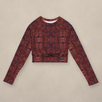 Vazzari Crimson Deities Crop Top on beige studio wall