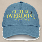 Vazzari Culture Overdose Hat – Dolly on beige studio wall