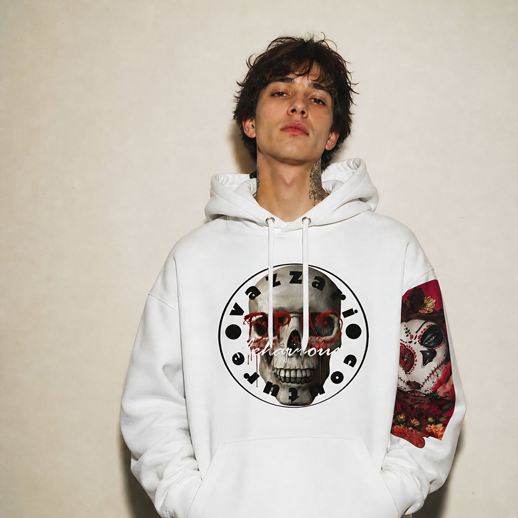 Model wearing the Vazzari Deadly Behaviour Hoodie in a beige studio