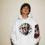 Model wearing the Vazzari Deadly Behaviour Hoodie in a beige studio