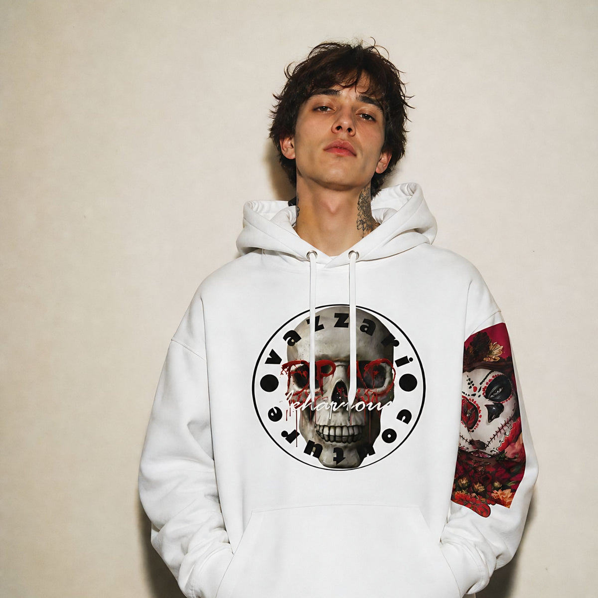 Model wearing the Vazzari Deadly Behaviour Hoodie in a beige studio