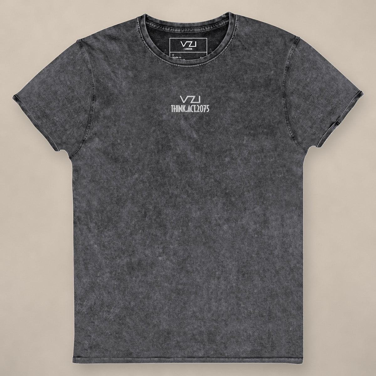Vazzari Denim Club Tee on beige studio wall