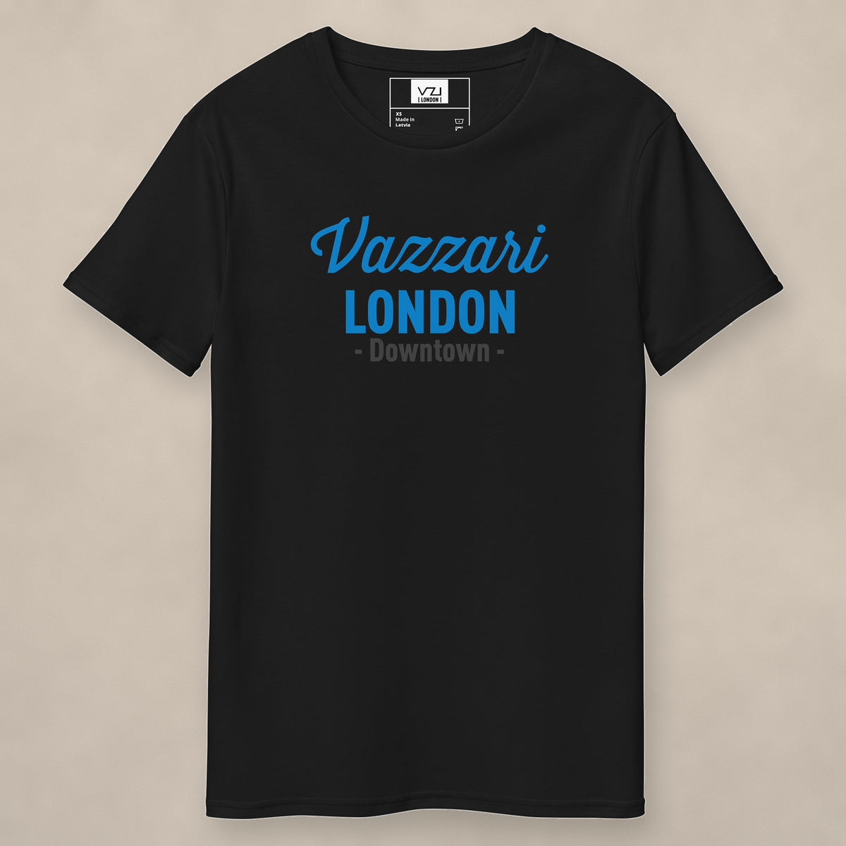Vazzari Downtown London Tee – Navy on beige studio wall