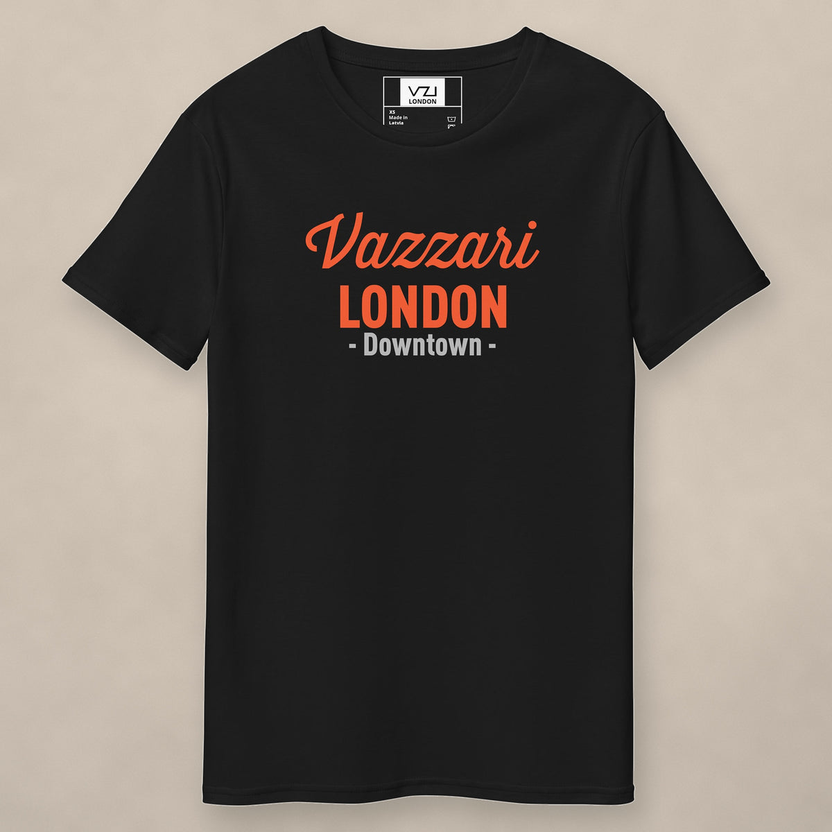 Vazzari Downtown London Tee – Orange on beige studio wall
