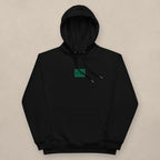 Vazzari Eco Hoodie – Green on beige studio wall
