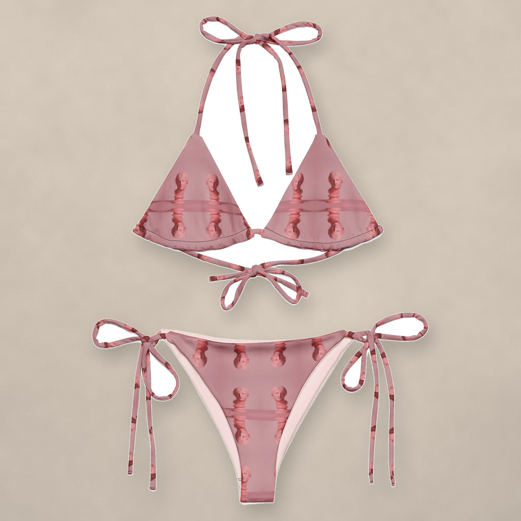 Vazzari Enigma Elegance String Bikini on beige studio wall