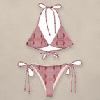 Vazzari Enigma Elegance String Bikini on beige studio wall