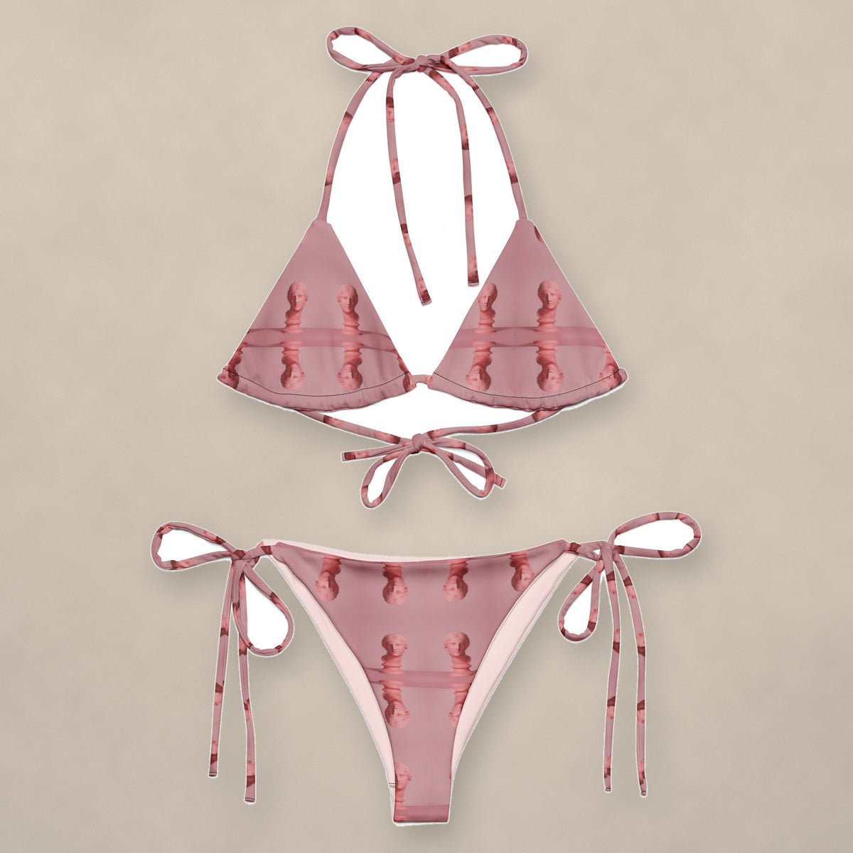 Vazzari Enigma Elegance String Bikini on beige studio wall
