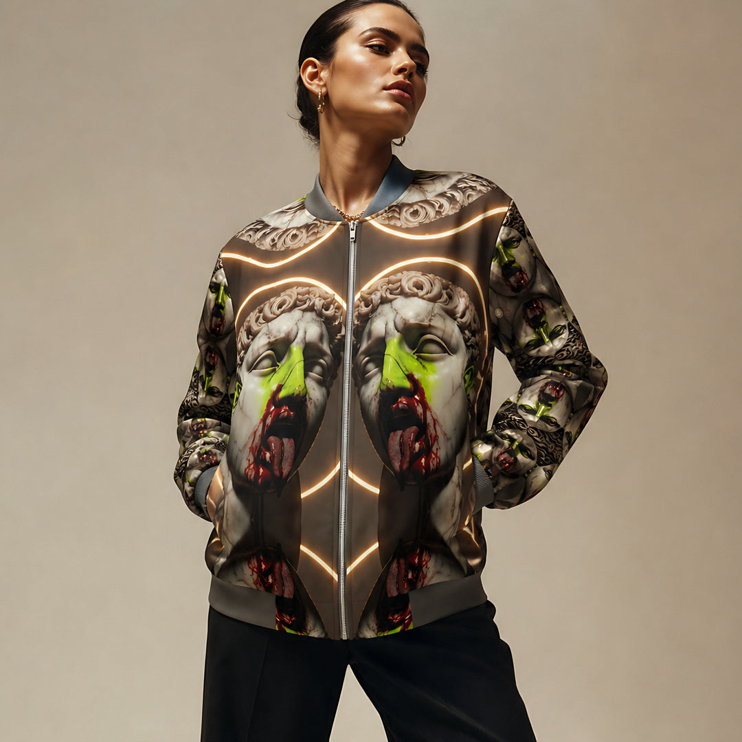Model wearing the Vazzari Forged Reversible Silk Bomber in a beige studio