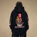 Model wearing the Vazzari Genus Intellectus Hoodie in a beige studio