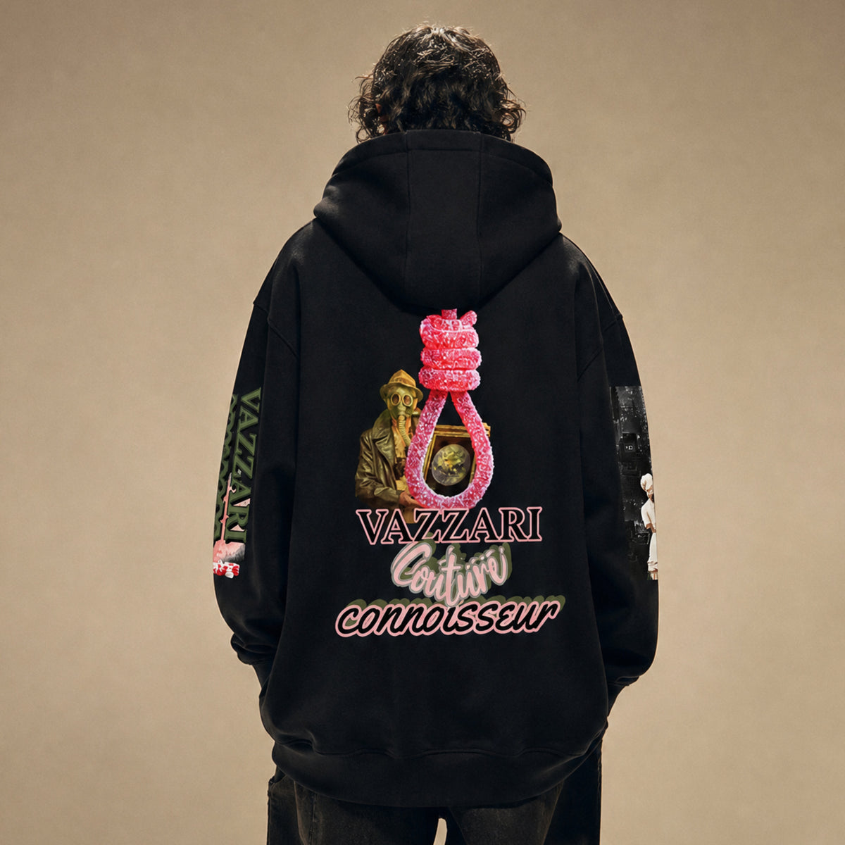 Model wearing the Vazzari Genus Intellectus Hoodie in a beige studio