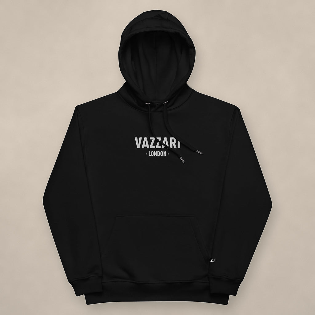 Vazzari London Unisex Hoodie on beige studio wall