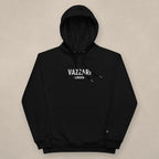 Vazzari London Unisex Hoodie on beige studio wall