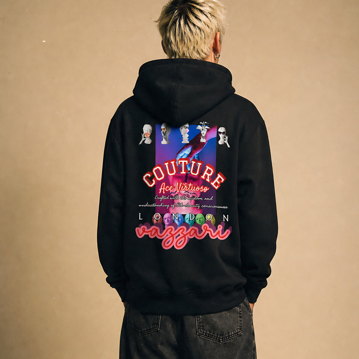 Model wearing the Vazzari Manipulator's Mark Hoodie in a beige studio
