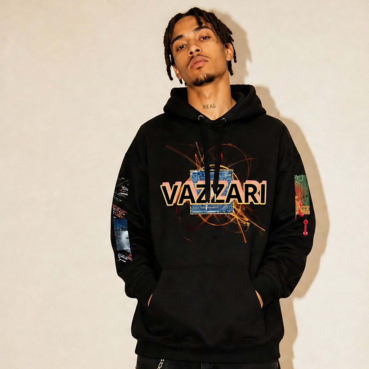 Model wearing the Vazzari Mars Provenance Hoodie in a beige studio