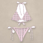 Vazzari Metaverse Deceiver Bikini on beige studio wall
