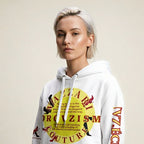 Model wearing the Vazzari ORGVZISM Blanc Hoodie in a beige studio