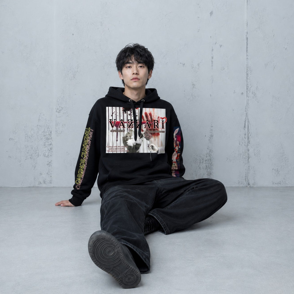 Model wearing the Vazzari Trauma Bonding Hoodie – Noir in a beige studio