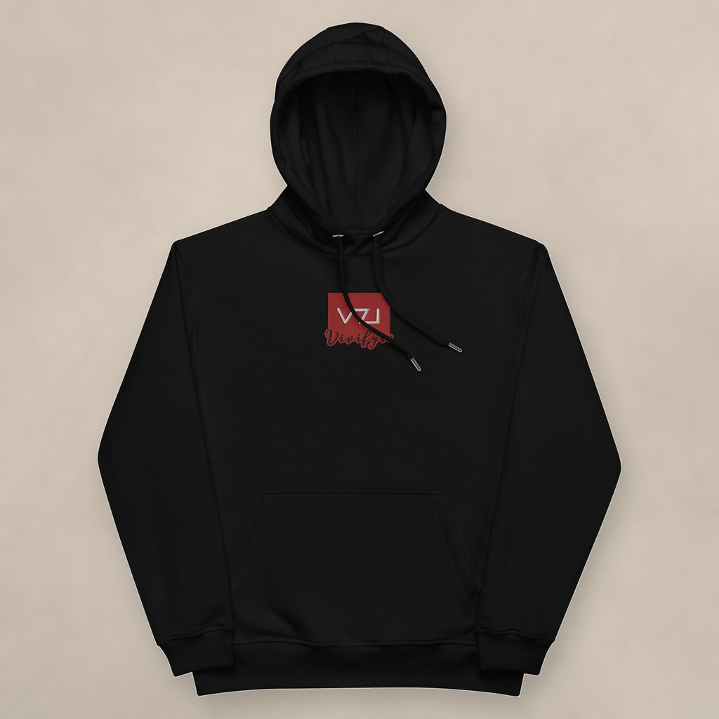 Vazzari Vivifyre Eco Hoodie on beige studio wall