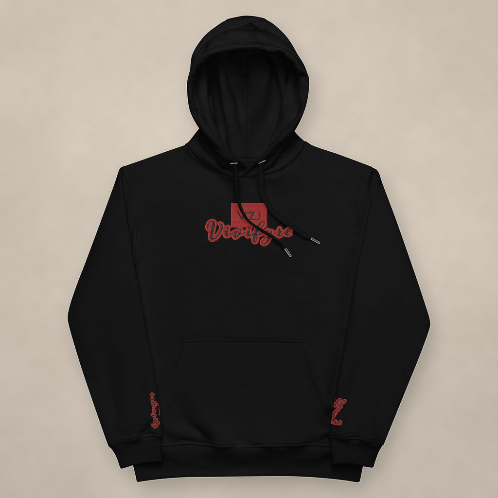 Vazzari Vivifyre Organic Hoodie on beige studio wall