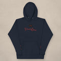 Vazzari Vivifyre Women's Hoodie on beige studio wall