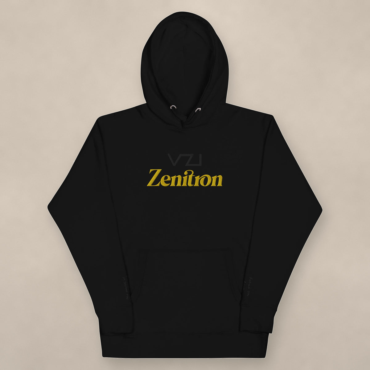 Vazzari Zenitron Hoodie on beige studio wall